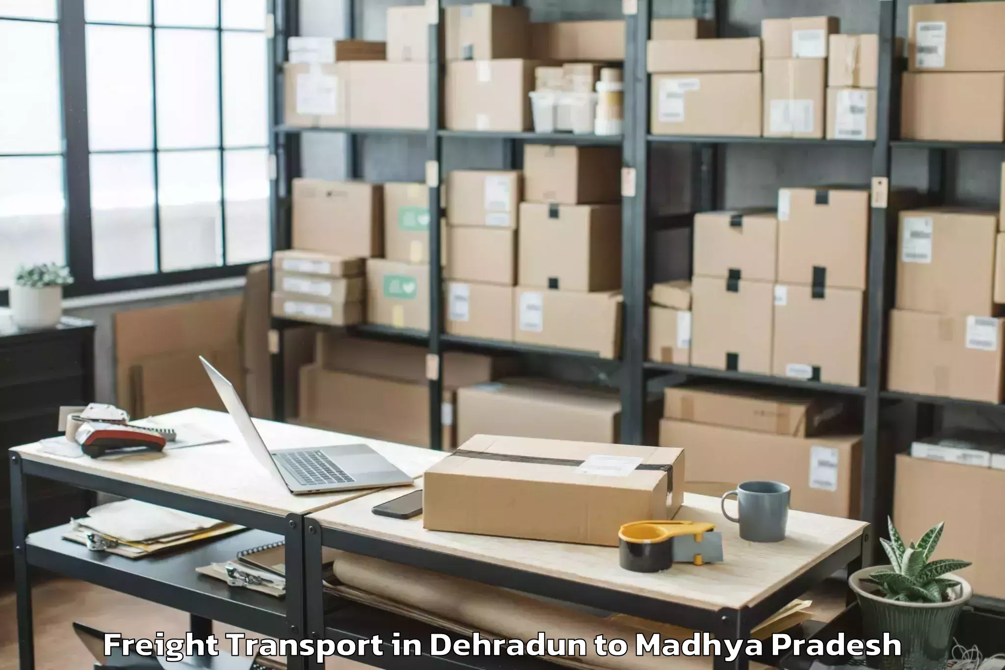 Book Dehradun to Daboh Freight Transport Online